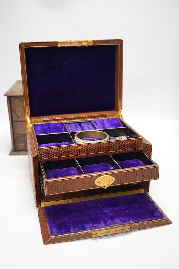 An early 20th century jewellery box and a similar oak stationery casket. Condition - poor